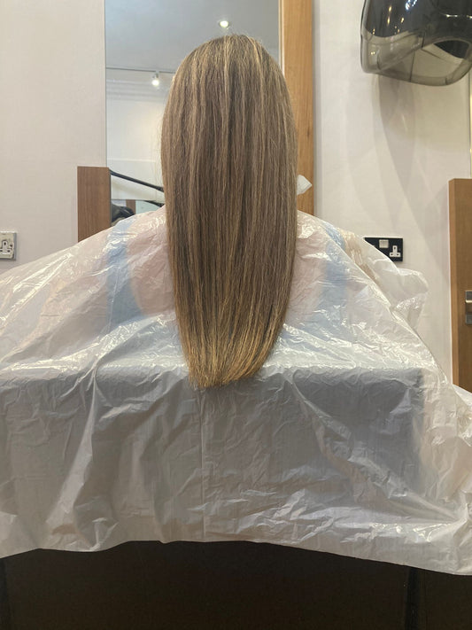 WHITE DISPOSABLE POLY CAPES - 1 Pack (each pack contains 100 capes)